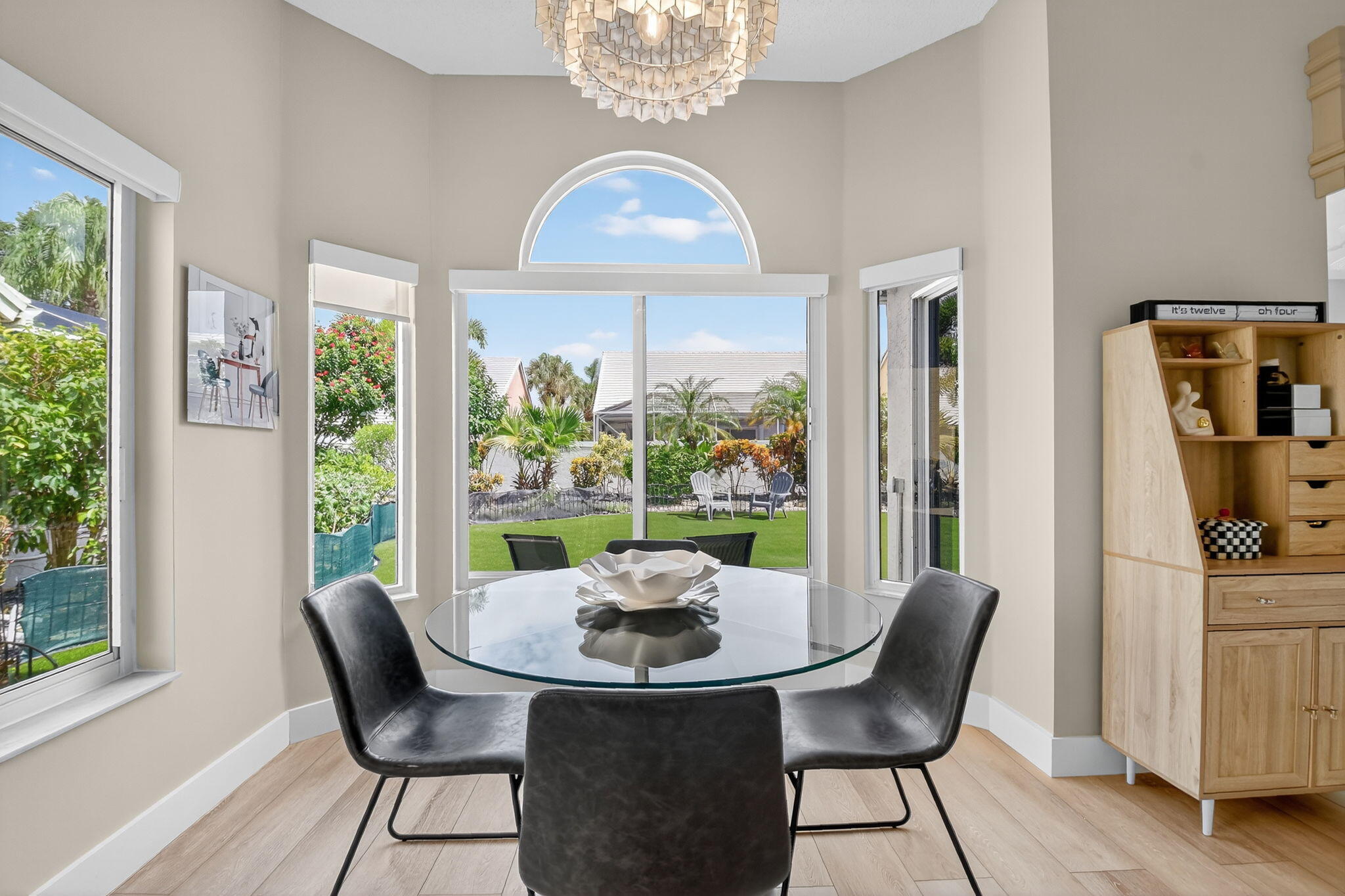 8385 Horseshoe Bay Road Boynton Beach, FL 33472 - Photo 13 of 49 a view of a dining room with furniture window and outside view