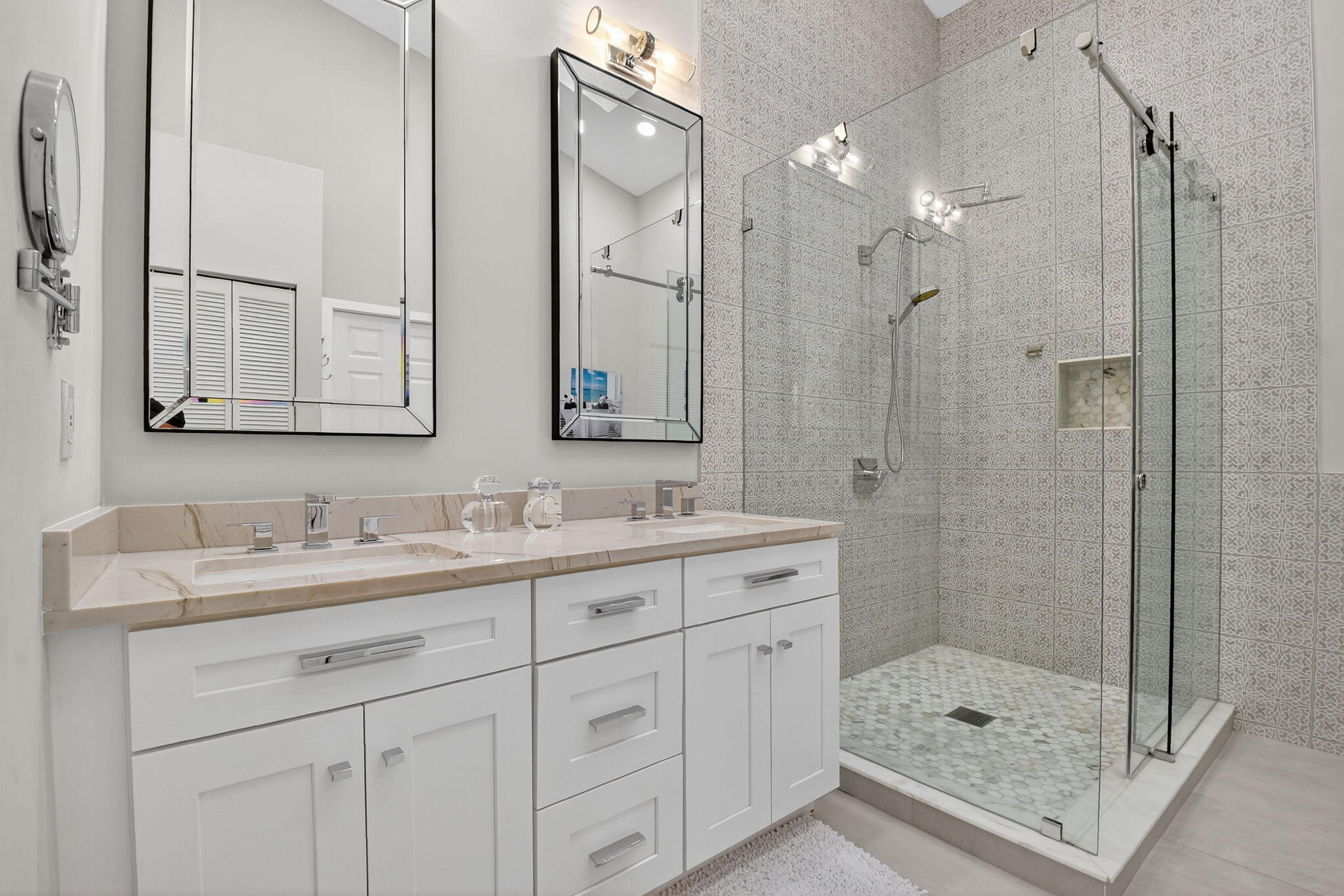 8385 Horseshoe Bay Road Boynton Beach, FL 33472 - Photo 17 of 49 a bathroom with a shower sink and mirror