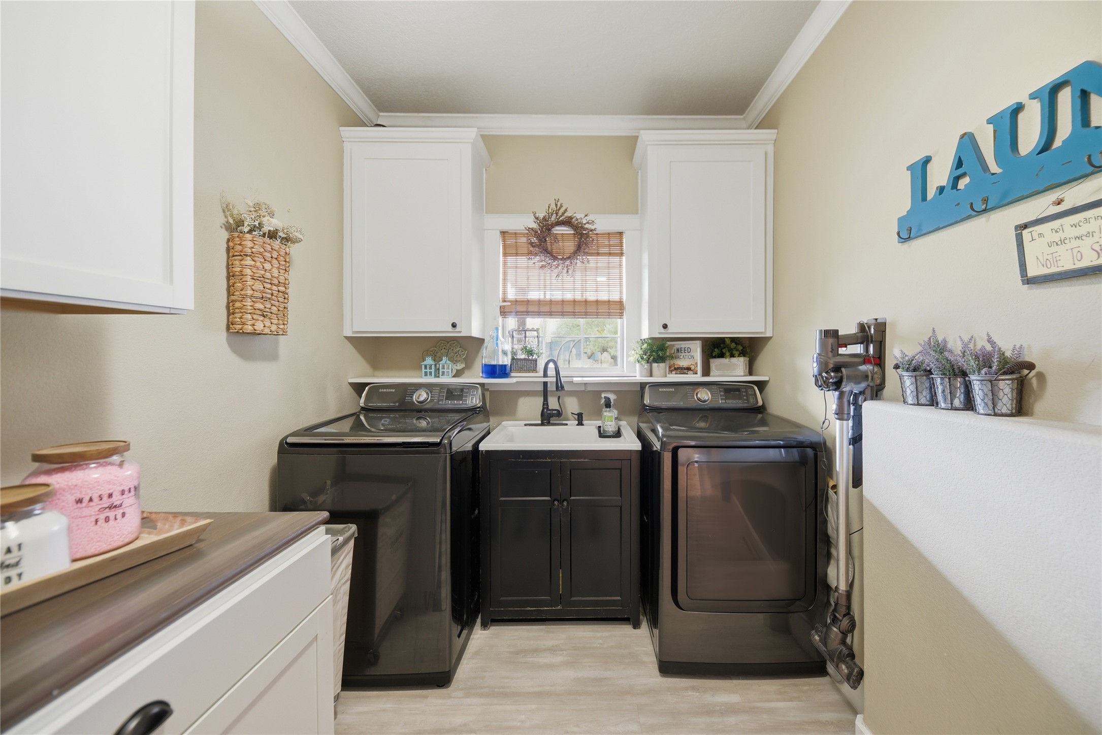 305 Affleck Road Brenham, TX 77833 - Photo 12 of 43 a kitchen with a stove and a sink