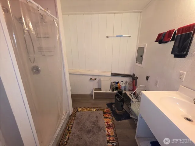 a kids room with wooden floor and furniture