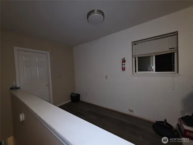 a bathroom with a sink and vanity