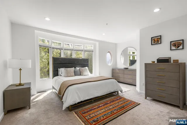 a utility room with sink dryer and washer