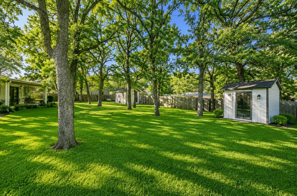 209 Mistletoe Lane Keene, TX 76059 - Photo 37 of 38 a view of a house with a big yard