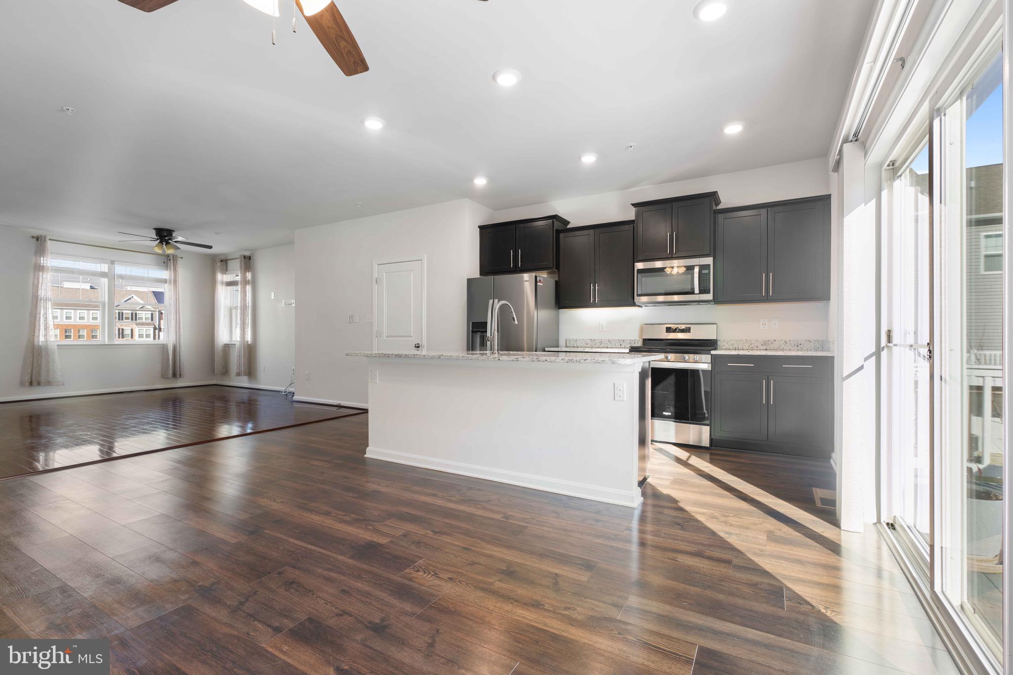 9710 Ruby Lockhart Boulevard Bowie, MD 20721 - Photo 8 of 40 Dining & Kitchen Overlooking Living Room