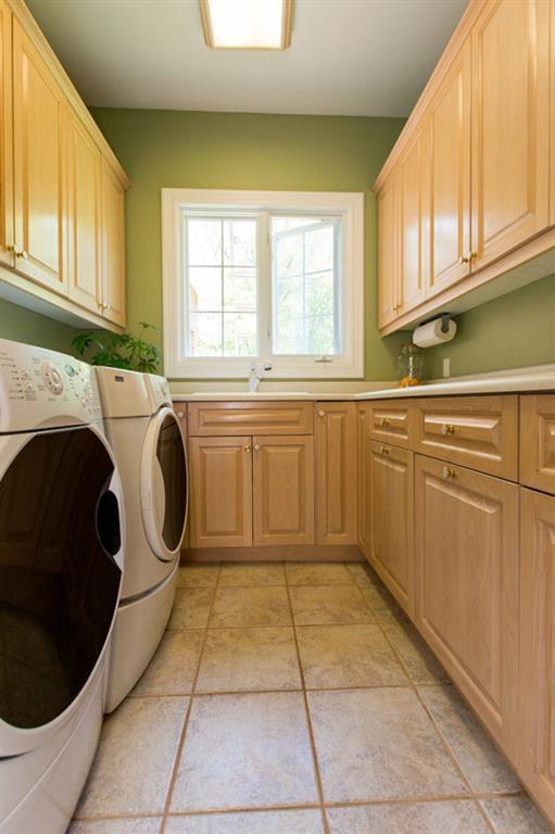 340 Woodside Road Brunswick, ME 04011 - Photo 15 of 35 Laundry room with a sink and lots of...