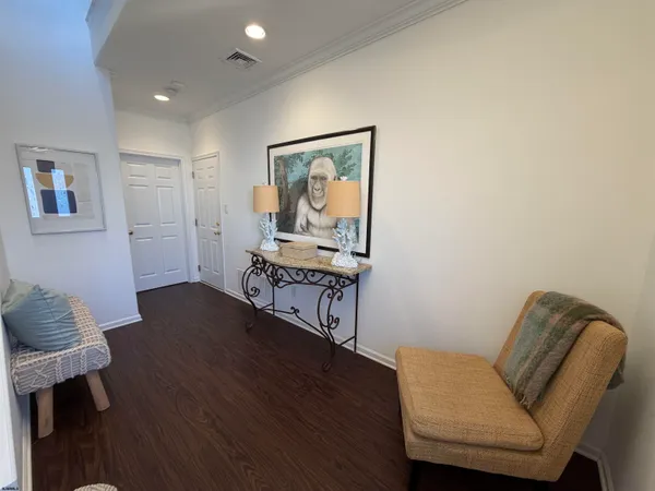 a workspace with furniture and wooden floor