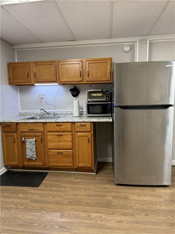 975 Ridgedale Drive Lawrenceville, GA 30043 - Photo 22 of 31 a view of a kitchen with refrigerator and cabinet