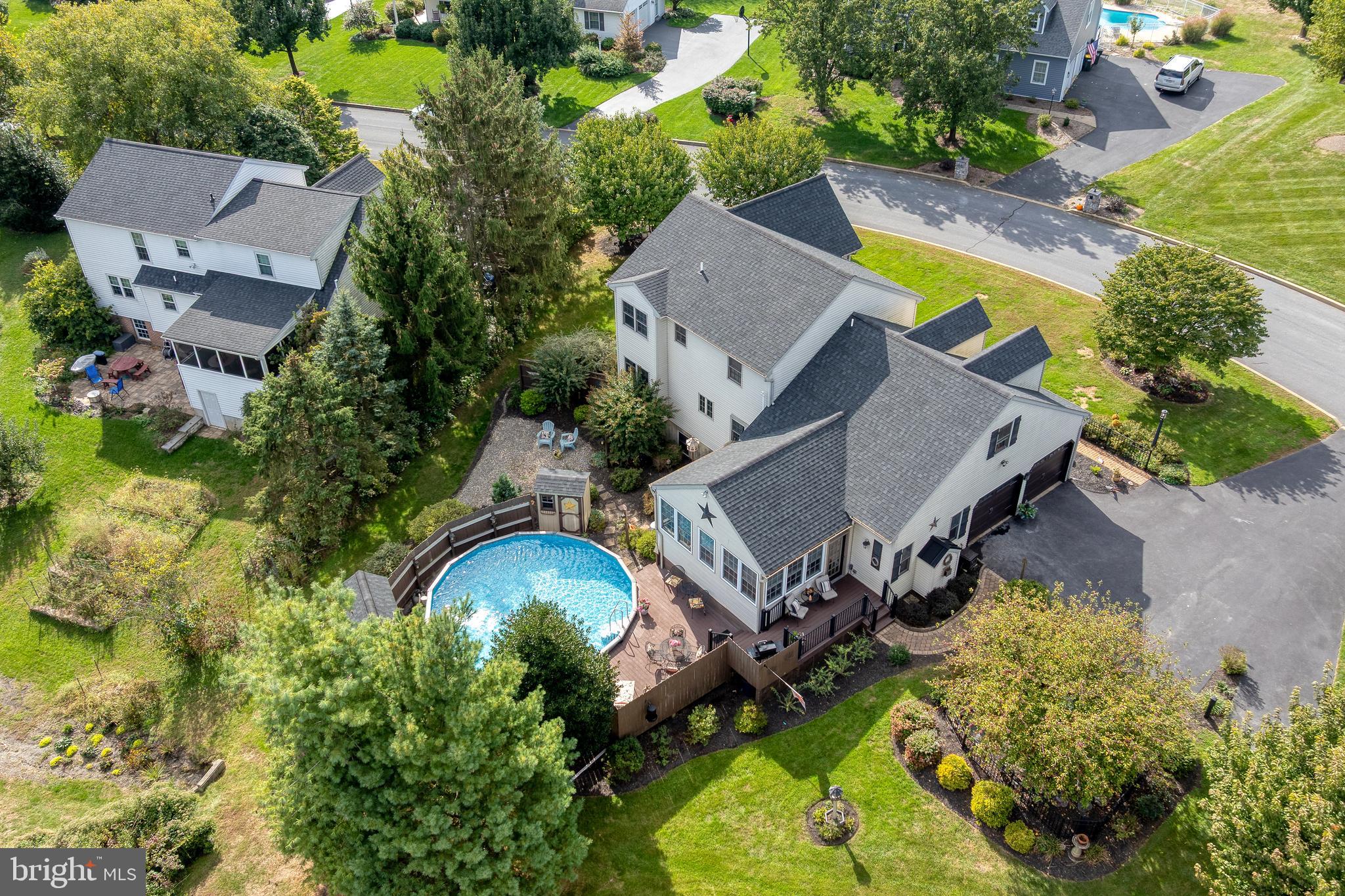 5 Village Drive Lititz, PA 17543 - Photo 56 of 62 an aerial view of a house with swimming pool and garden