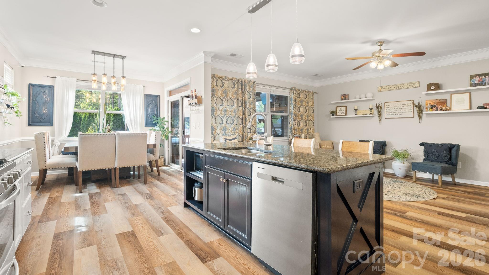 4708 Summerside Drive Clover, SC 29710 - Photo 22 of 48 a living room with granite countertop kitchen island furniture and a chandelier