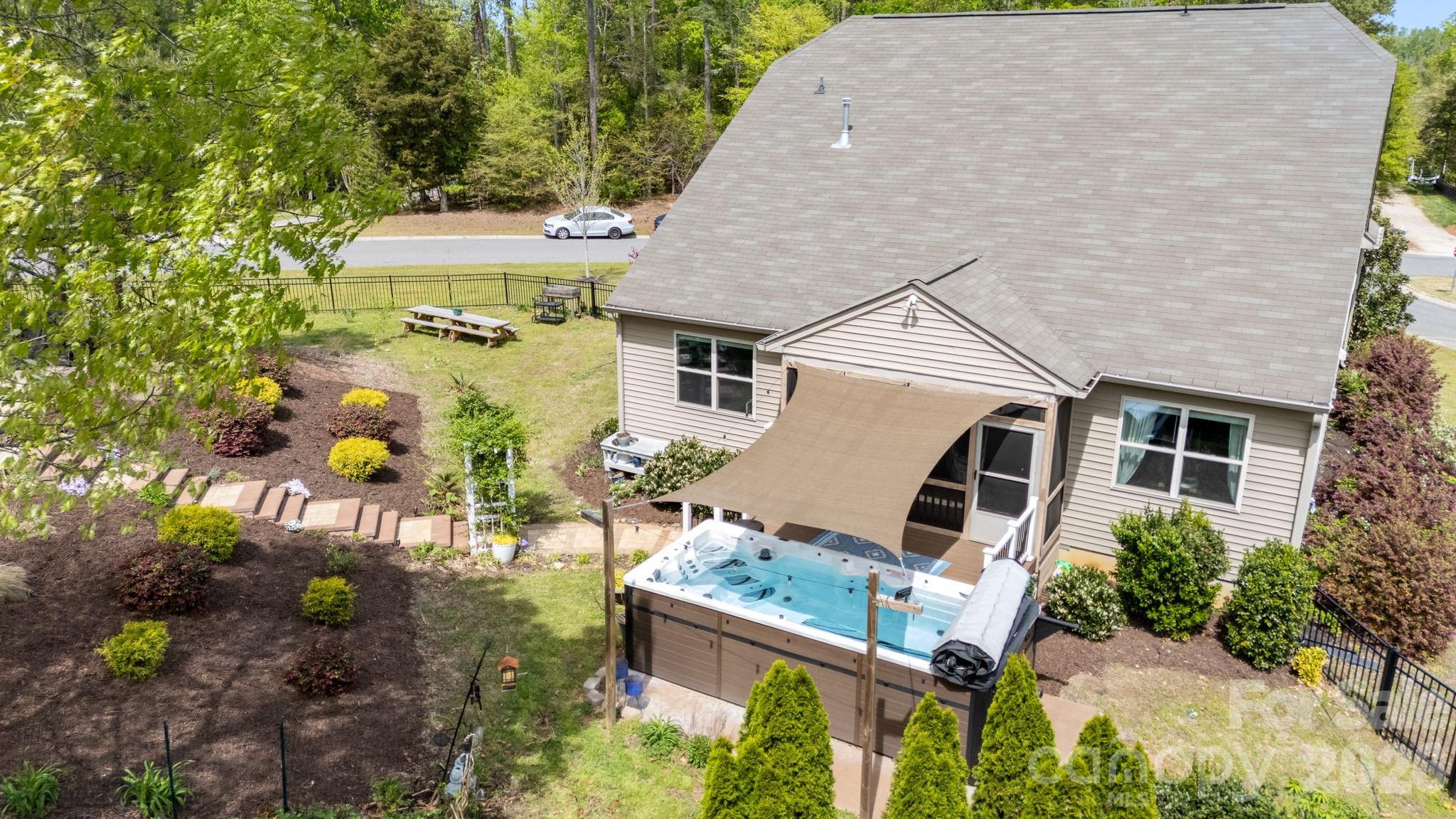 4708 Summerside Drive Clover, SC 29710 - Photo 45 of 48 a aerial view of a house with table and chairs in patio