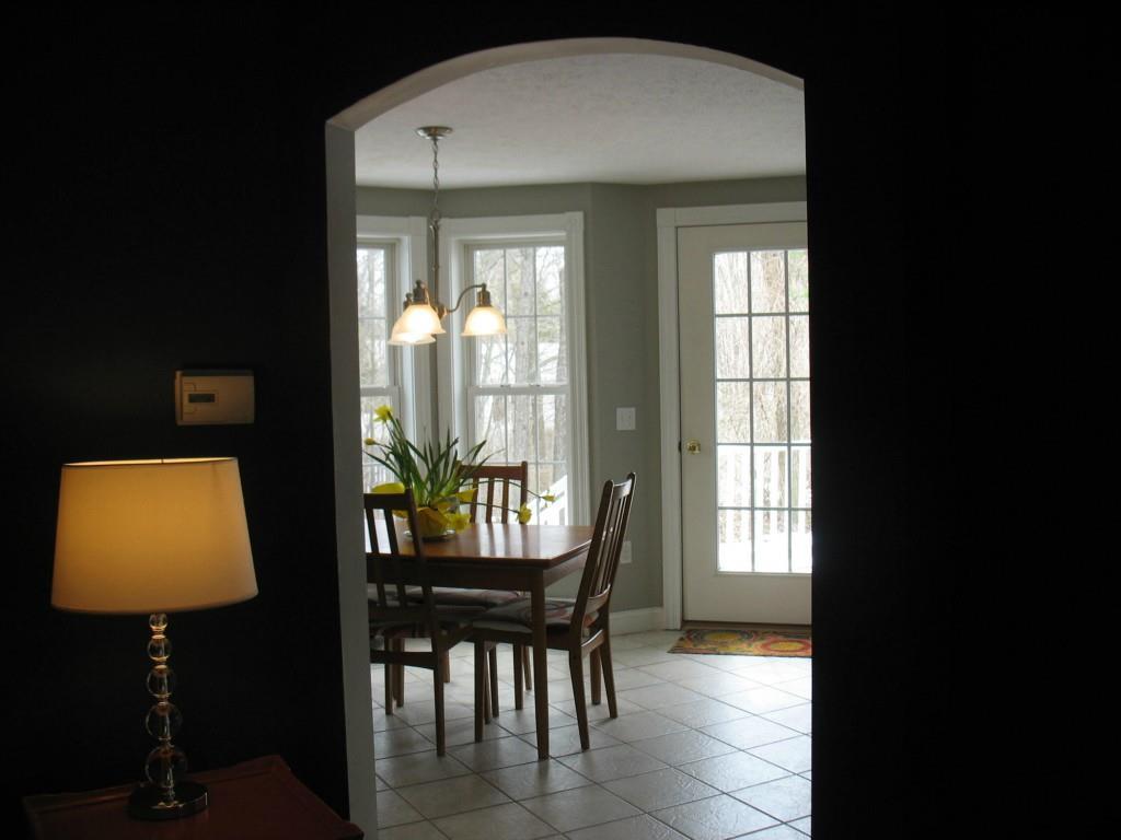 61 Ocean Park Road, Unit 1 Saco, ME 04072 - Photo 5 of 18 Entry for living room to the kitchen...