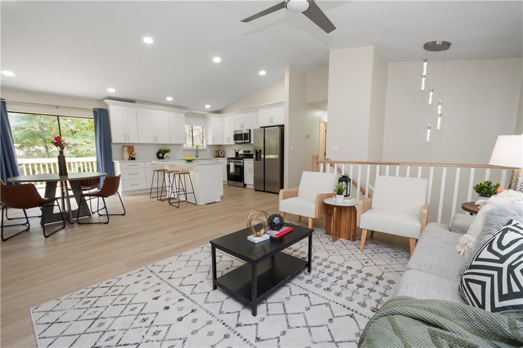 2432 Mistletoe Lane Southwest Snellville, GA 30039 - Photo 14 of 42 a living room with furniture and a large window