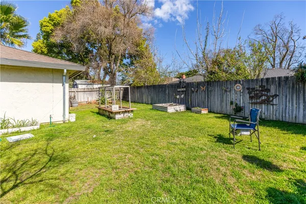 a view of a backyard with a small cabin