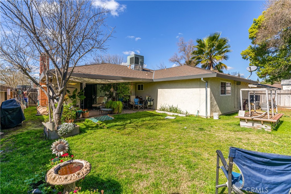 3552 Wathen Court Merced, CA 95348 - Photo 13 of 14 a view of a house with backyard and sitting area