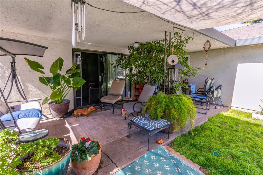 3552 Wathen Court Merced, CA 95348 - Photo 14 of 14 a view of a backyard with plants and a patio
