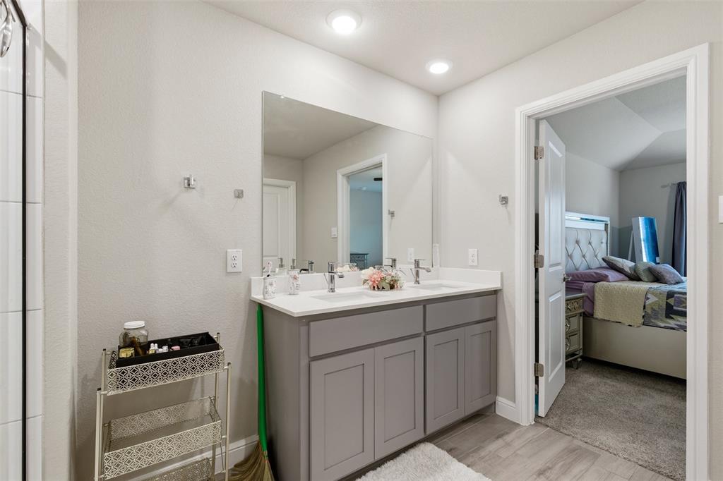 333 Alice Harney Road Burleson, TX 76028 - Photo 12 of 36 a en suite bathroom with a sink double vanity