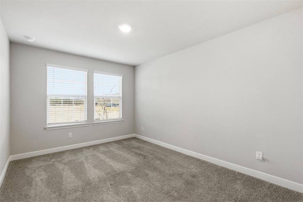 333 Alice Harney Road Burleson, TX 76028 - Photo 21 of 36 an empty room with a window