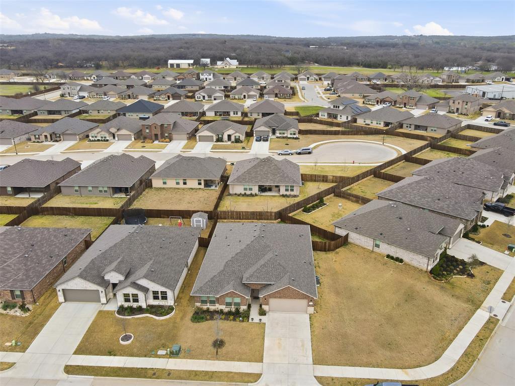 333 Alice Harney Road Burleson, TX 76028 - Photo 33 of 36 an aerial view of residential houses with outdoor space