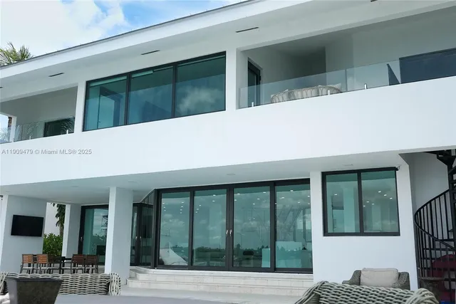 swimming pool view with a garden and plants