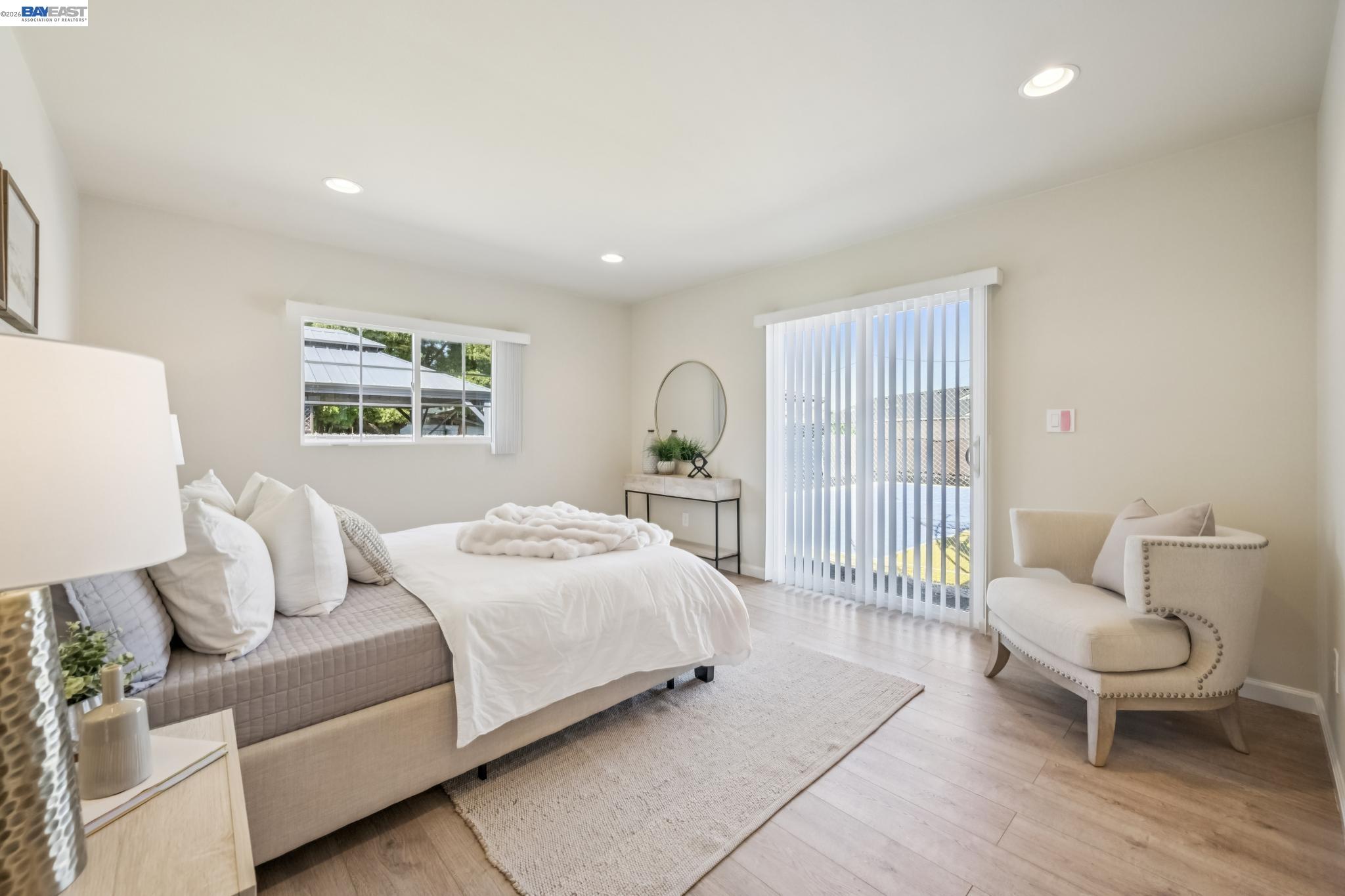 21132 Tyee Court Castro Valley, CA 94546 - Photo 18 of 60 a bedroom with a bed and a large window