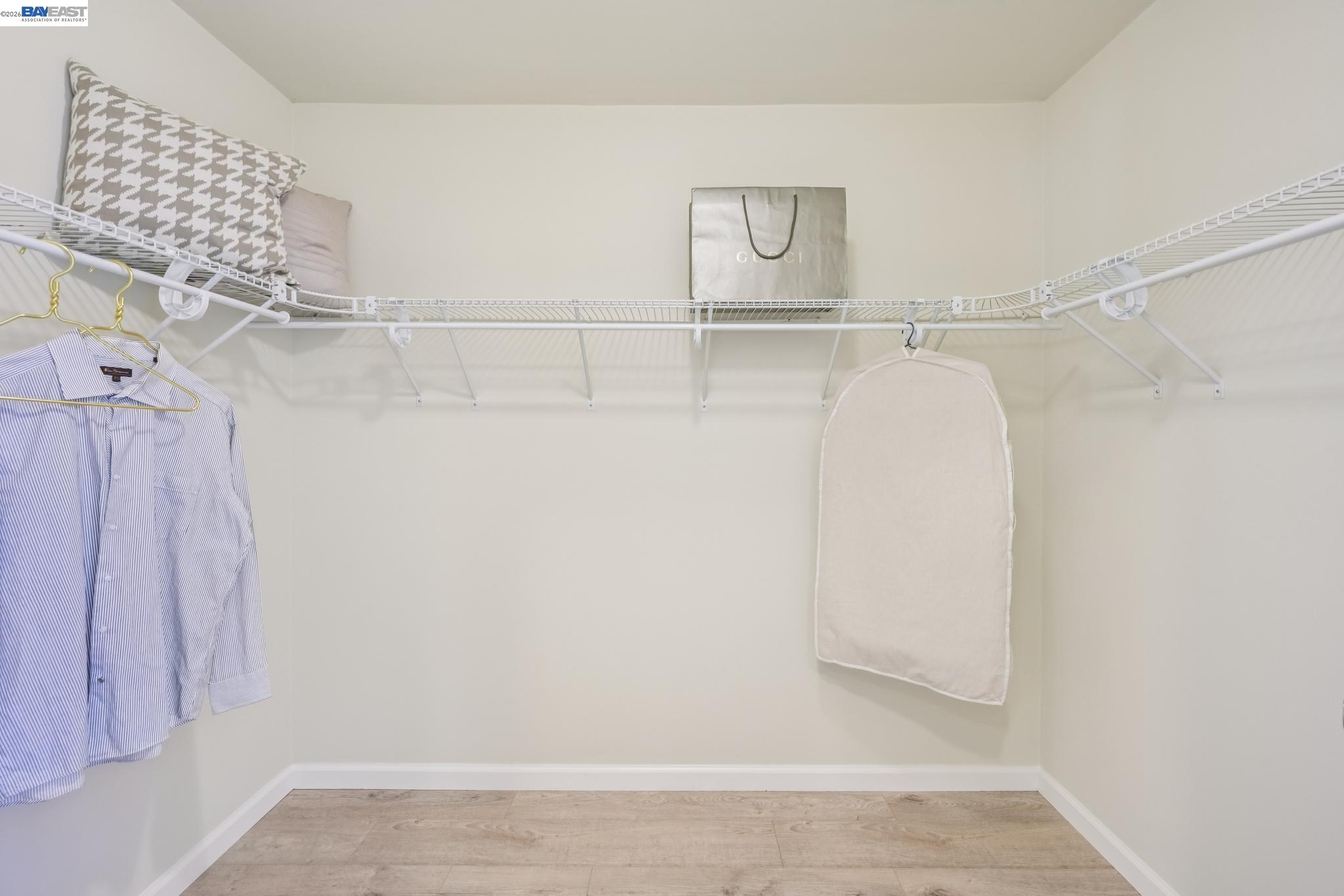 21132 Tyee Court Castro Valley, CA 94546 - Photo 22 of 60 a view of a room with racks on the wall