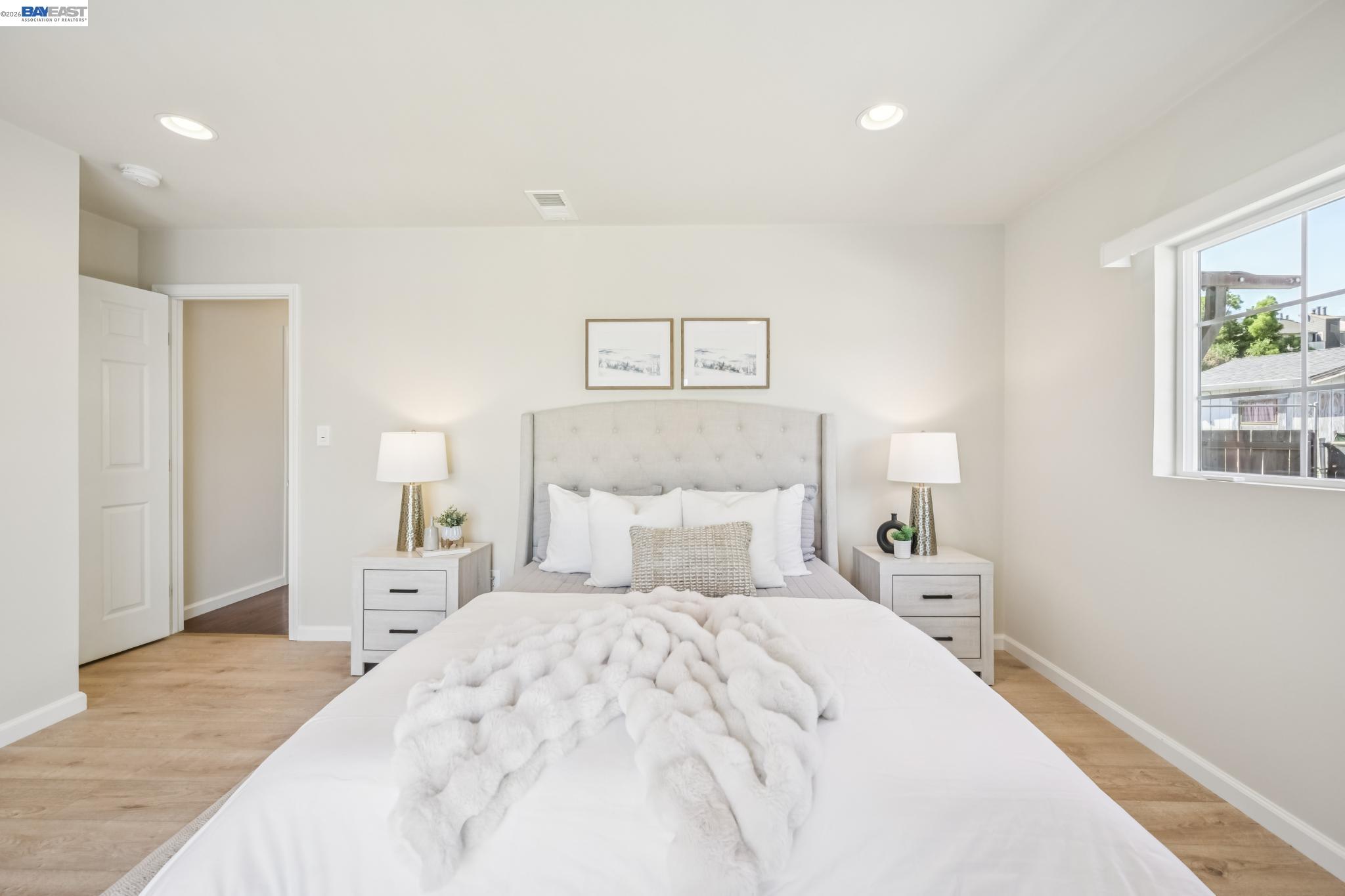21132 Tyee Court Castro Valley, CA 94546 - Photo 27 of 60 a bedroom with a bed and a large mirror