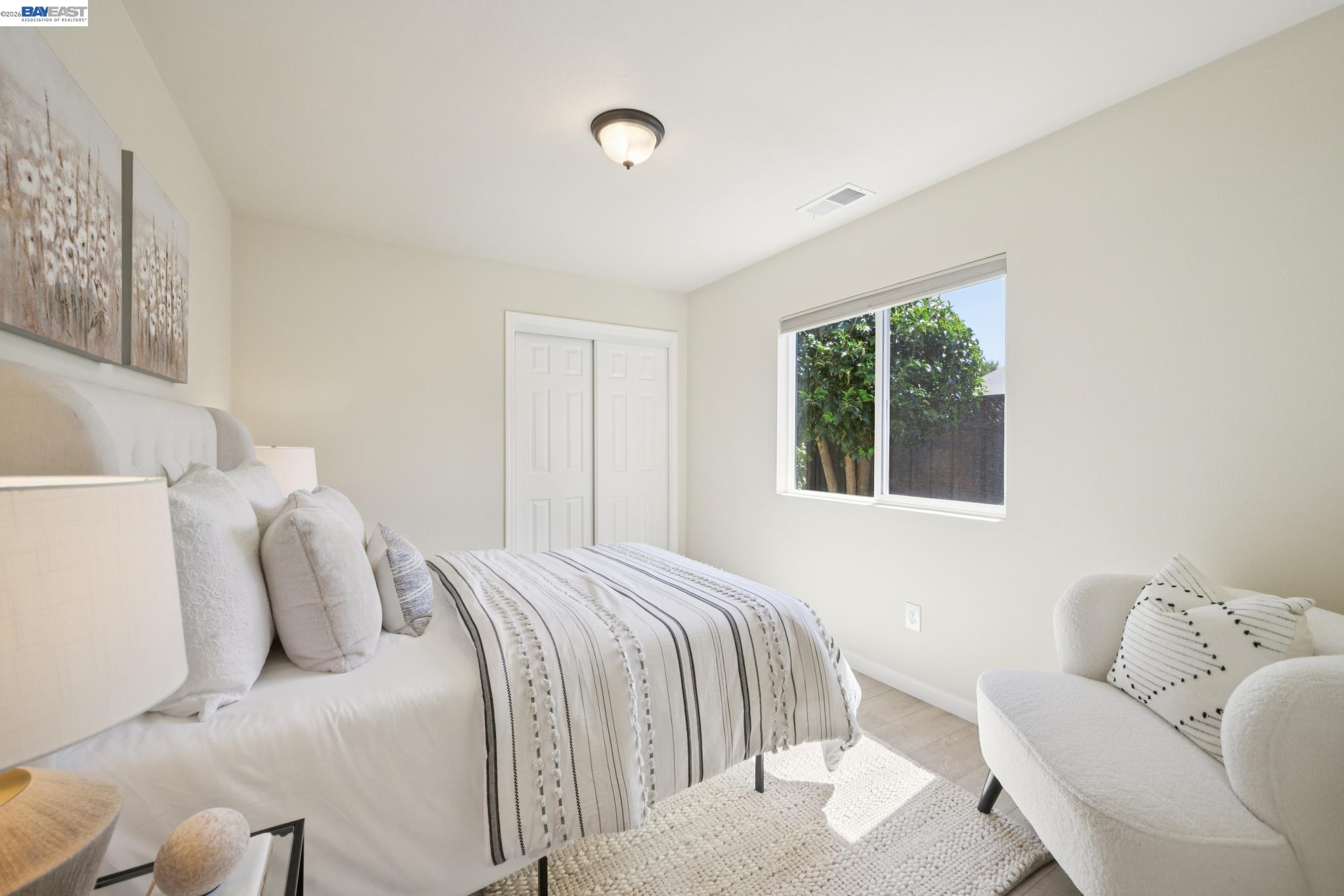 21132 Tyee Court Castro Valley, CA 94546 - Photo 35 of 60 a bedroom with a bed and a couch