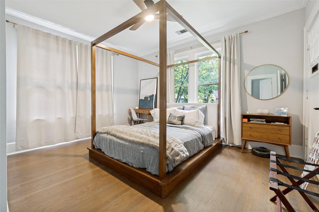 5235 Goodwin Avenue Dallas, TX 75206 - Photo 23 of 31 a bed room with a bed window and a table