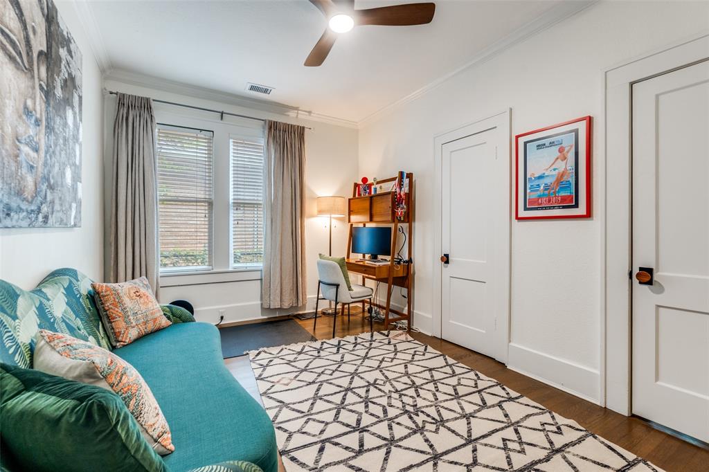 5235 Goodwin Avenue Dallas, TX 75206 - Photo 25 of 31 a bedroom with a bed and a window