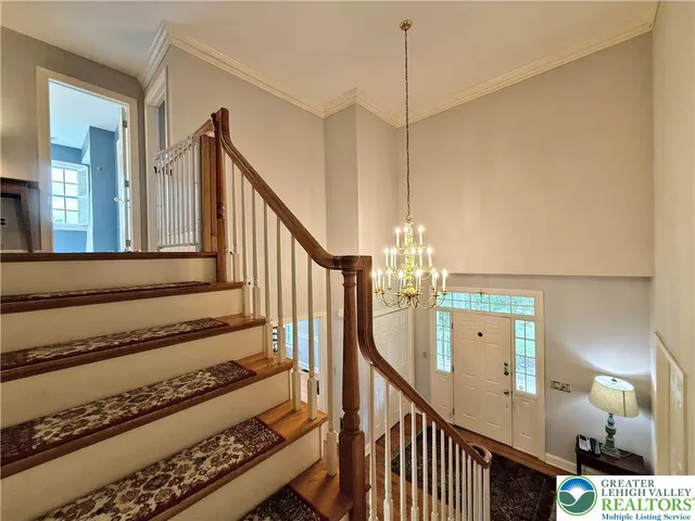 a large kitchen with a table and chairs