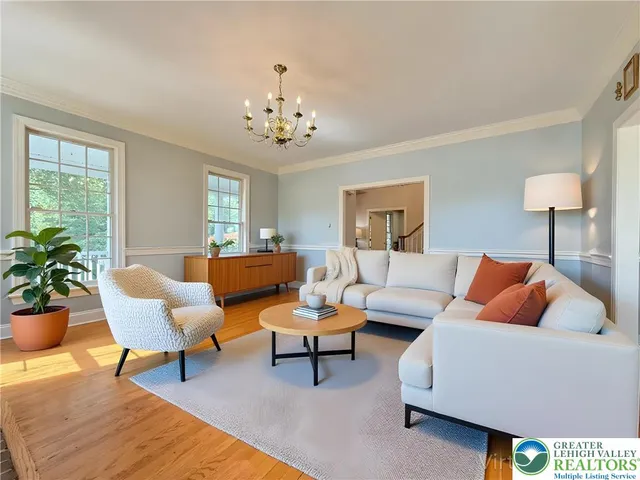 a view of a brick house with a large window