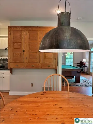 a living room with a bed and furniture
