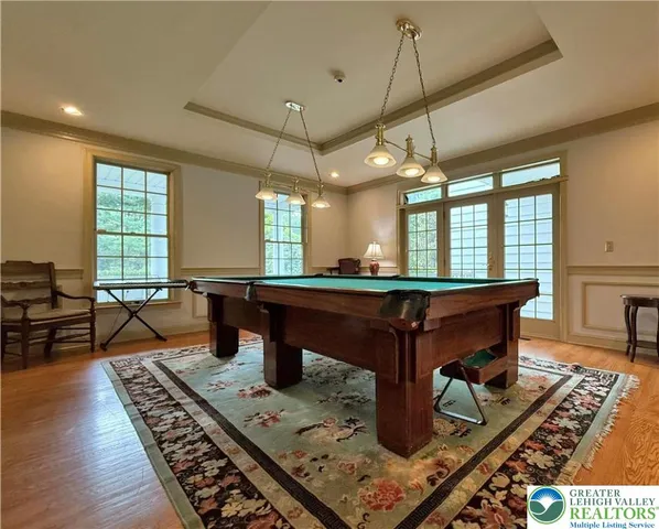 a bedroom with bed and a window