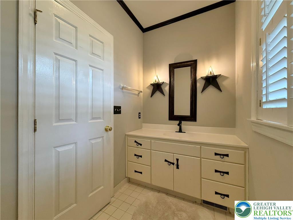 1997 West Point Drive Bethlehem, PA 18015 - Photo 43 of 94 a bathroom with a double vanity sink and mirror
