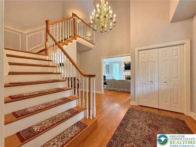 a kitchen with stainless steel appliances kitchen island granite countertop a stove and cabinets