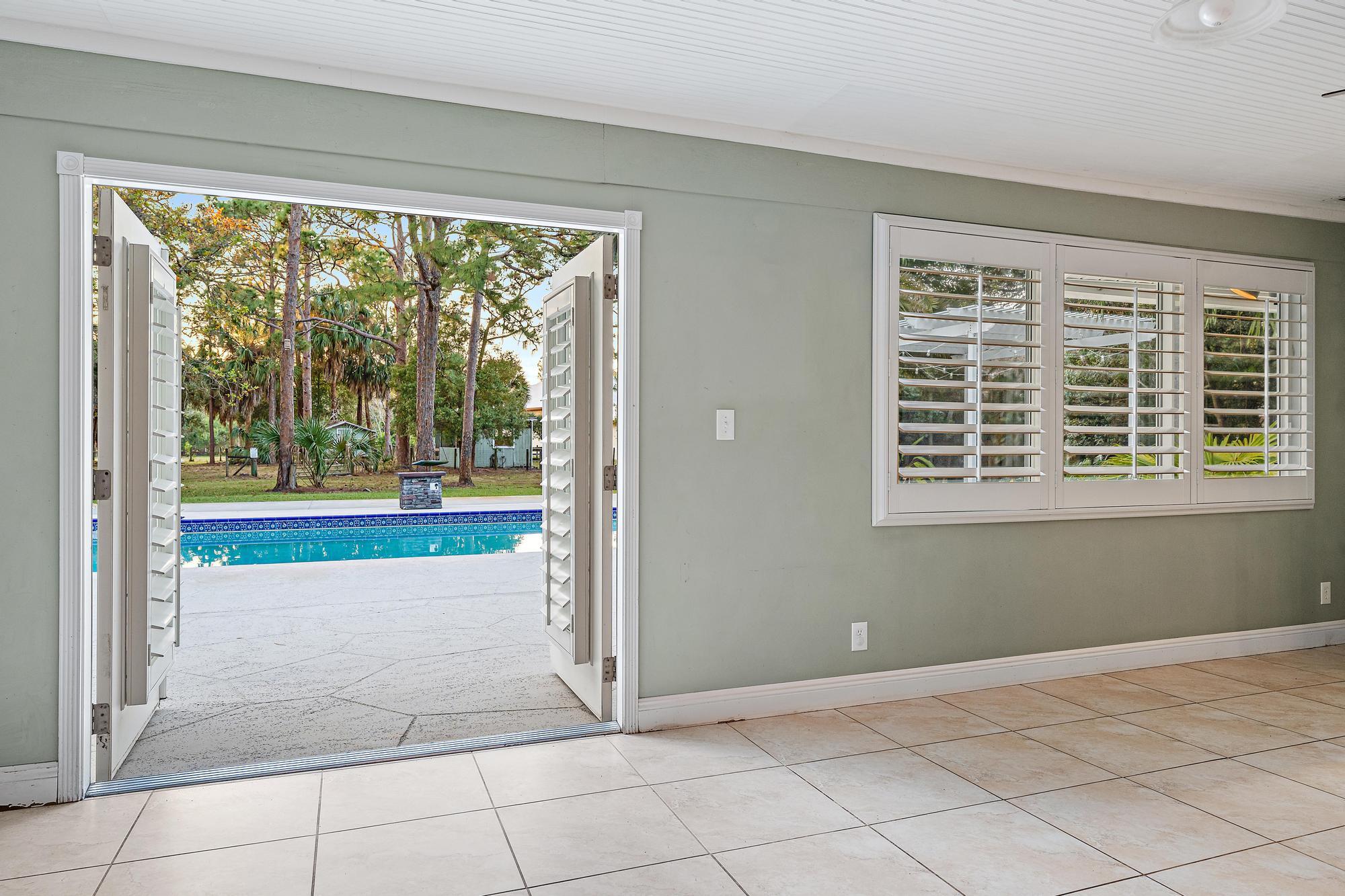 19150 Southeast Jupiter Road Jupiter, FL 33458 - Photo 15 of 58 Florida Room