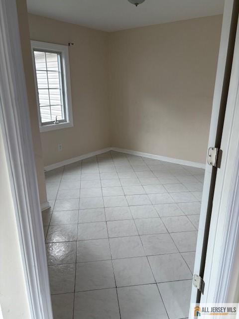 327 Leon Avenue, Unit 1 Perth Amboy, NJ 08861 - Photo 14 of 20 a view of an empty room and a window