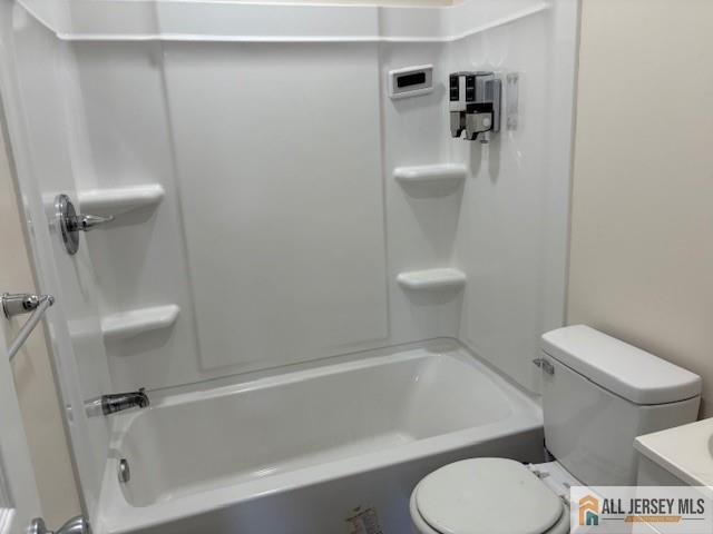 327 Leon Avenue, Unit 1 Perth Amboy, NJ 08861 - Photo 17 of 20 a white toilet sitting next to a bath tub