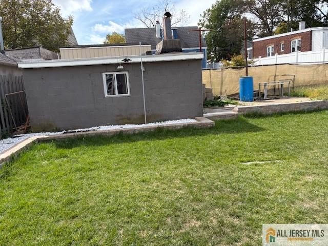 327 Leon Avenue, Unit 1 Perth Amboy, NJ 08861 - Photo 18 of 20 a view of a house with a yard and sitting area