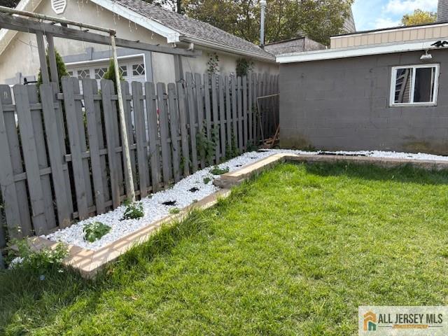 327 Leon Avenue, Unit 1 Perth Amboy, NJ 08861 - Photo 19 of 20 a backyard of a house with lots of green space
