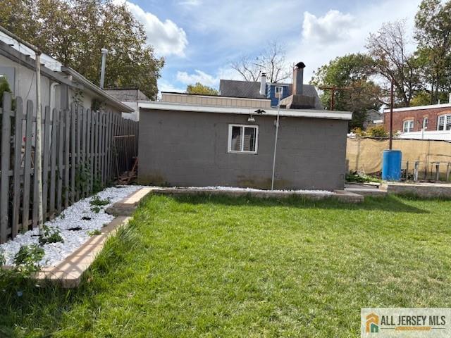 327 Leon Avenue, Unit 1 Perth Amboy, NJ 08861 - Photo 20 of 20 a backyard of a house with lots of green space