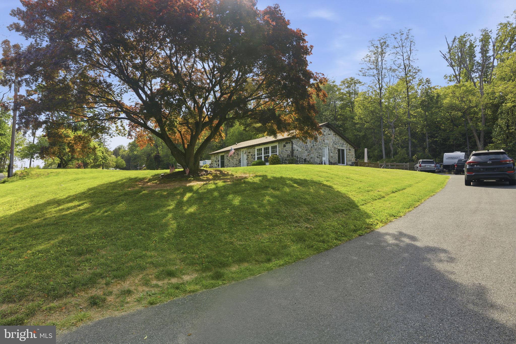 1730 Ridge Road Whiteford, MD 21160 - Photo 4 of 33 Charming home nestled in lush greenery.