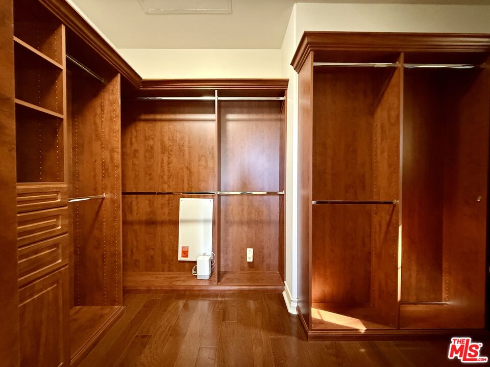 68 Cornflower Irvine, CA 92620 - Photo 13 of 21 a view of walk in closet with empty racks