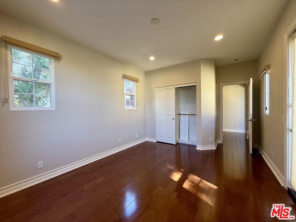 68 Cornflower Irvine, CA 92620 - Photo 15 of 21 a view of empty room with wooden floor and fan