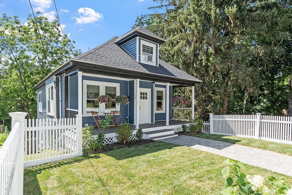 10 Burnham Road Andover, MA 01810 - Photo 1 of 25 a front view of a house with a yard