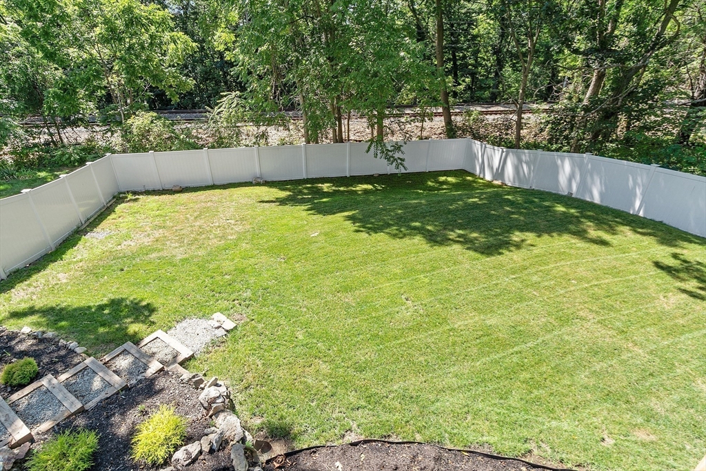 10 Burnham Road Andover, MA 01810 - Photo 20 of 25 a view of swimming pool with a patio