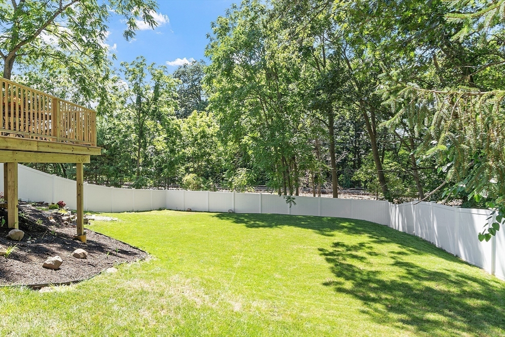 10 Burnham Road Andover, MA 01810 - Photo 21 of 25 a swimming pool with outdoor seating and yard
