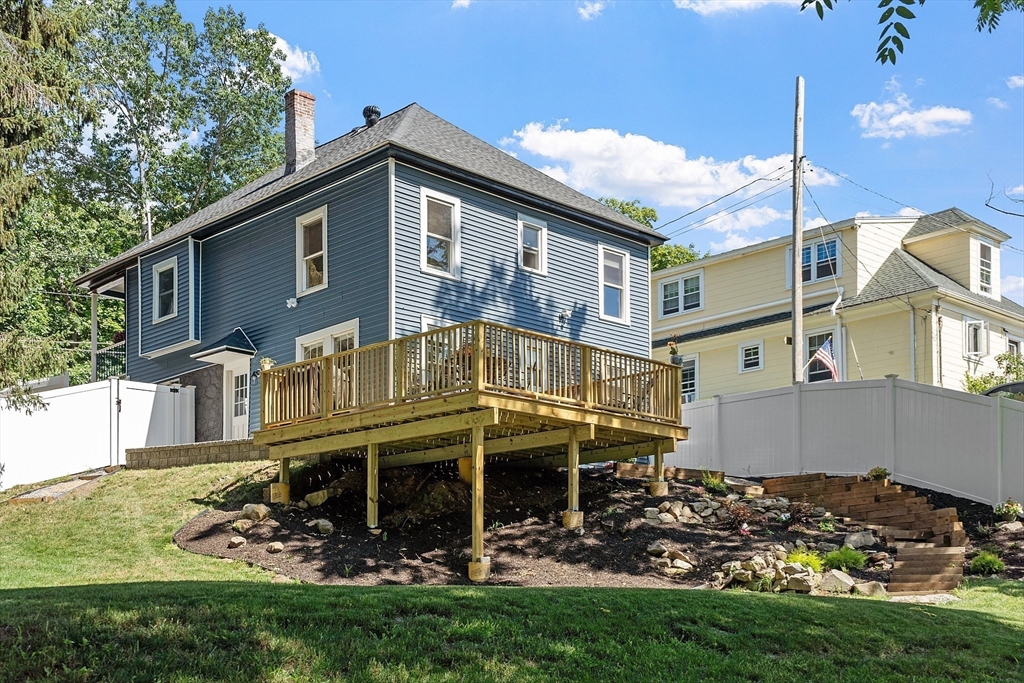 10 Burnham Road Andover, MA 01810 - Photo 22 of 25 a view of a house with backyard