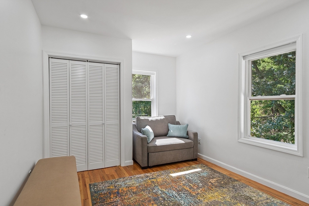 10 Burnham Road Andover, MA 01810 - Photo 8 of 25 a living room with furniture and a window