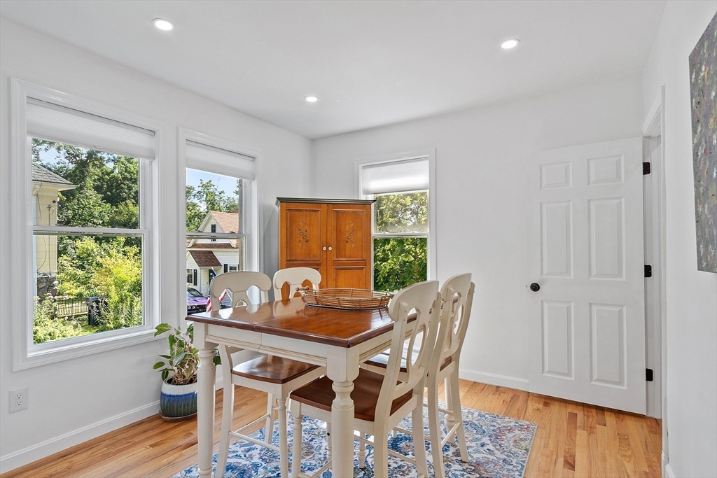 10 Burnham Road Andover, MA 01810 - Photo 10 of 25 a dining room with furniture and wooden floor